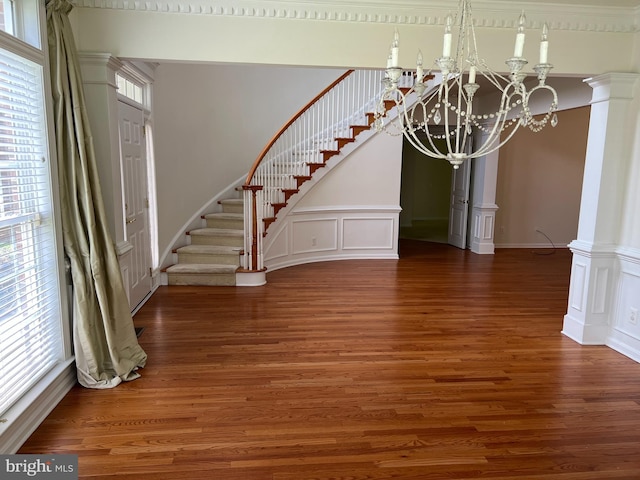 206 Excalibur Dr, Newtown Square, PA 19073 - foyer entrance featuring wood finished floors, a chandelier, and stairway