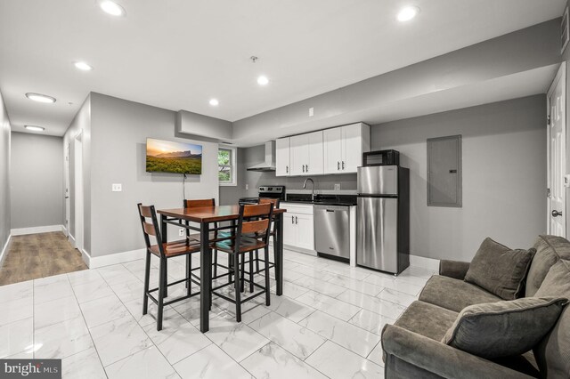 1719 W Norris St, Philadelphia, PA 19121 - dining area with light marble finish floors, recessed lighting, and electric panel