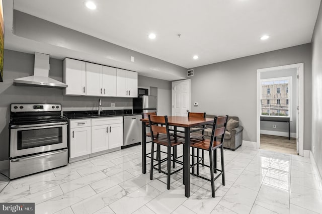 1719 W Norris St, Philadelphia, PA 19121 - dining space with light marble finish flooring and recessed lighting