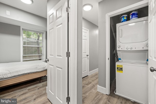 1719 W Norris St, Philadelphia, PA 19121 - washroom with stacked washer / drying machine and wood finished floors