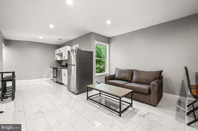 1719 W Norris St, Philadelphia, PA 19121 - living room featuring light marble finish floors and recessed lighting
