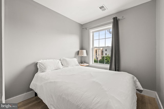1719 W Norris St, Philadelphia, PA 19121 - bedroom featuring baseboards and dark wood finished floors
