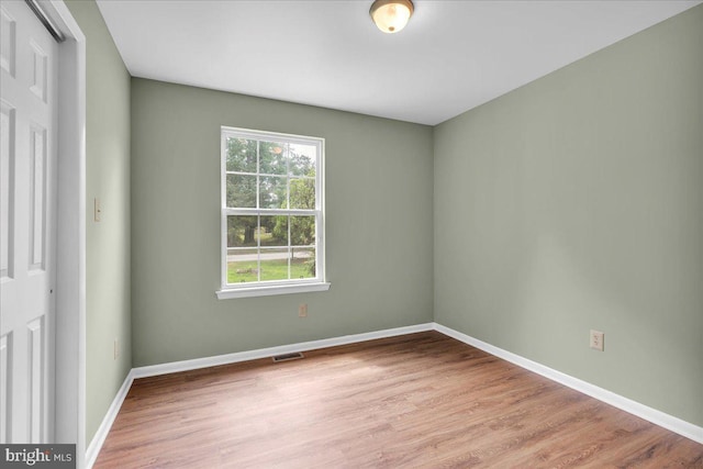 725 Logan Ave, Deptford, NJ 08096 - spare room featuring wood finished floors and baseboards