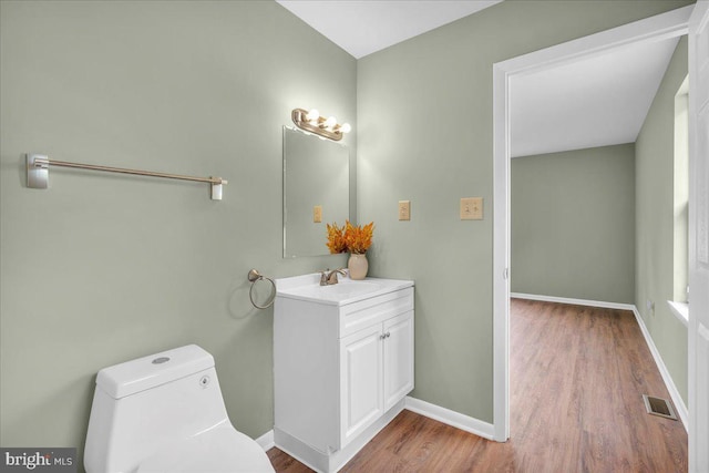 725 Logan Ave, Deptford, NJ 08096 - bathroom featuring vanity and wood finished floors
