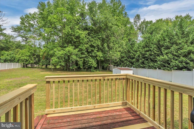 725 Logan Ave, Deptford, NJ 08096 - wooden deck featuring a storage unit and a fenced backyard