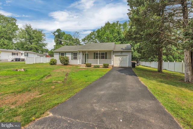 725 Logan Ave, Deptford, NJ 08096 - single story home with covered porch, an attached garage, and asphalt driveway