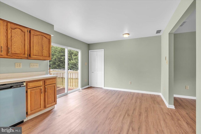 725 Logan Ave, Deptford, NJ 08096 - kitchen featuring dishwasher, light wood finished floors, light countertops, and brown cabinetry