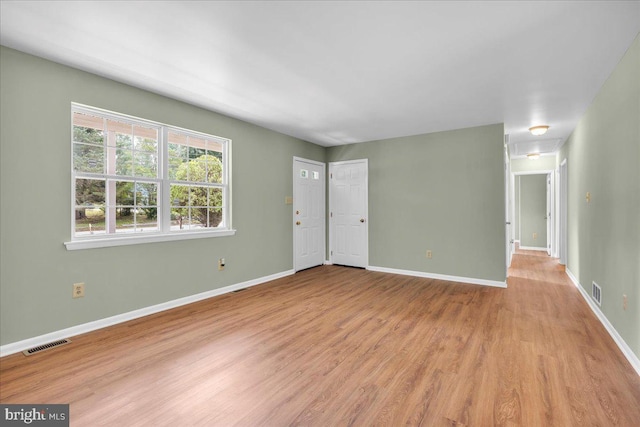 725 Logan Ave, Deptford, NJ 08096 - empty room featuring light wood finished floors and baseboards