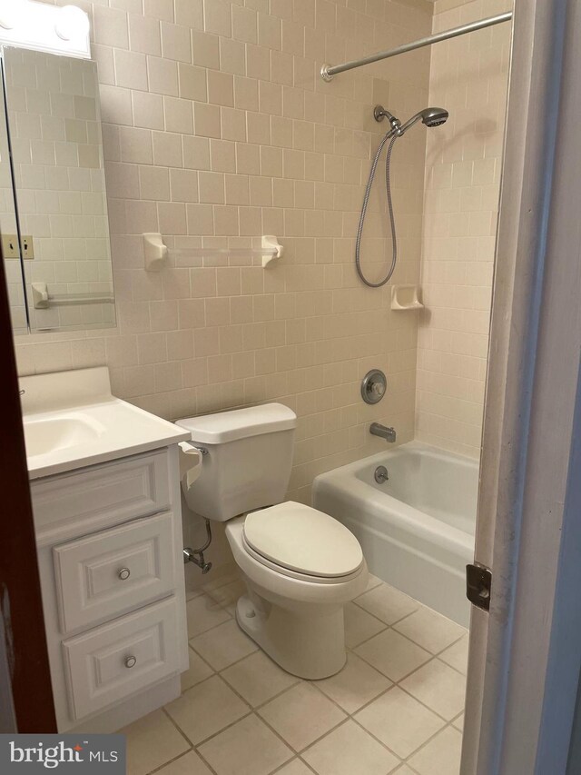 122 Elmtowne Blvd, Hammonton, NJ 08037 - bathroom featuring tile patterned floors, tub / shower combination, vanity, and tile walls