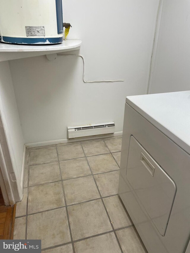 122 Elmtowne Blvd, Hammonton, NJ 08037 - laundry room with washer / clothes dryer, baseboard heating, light tile patterned floors, and water heater