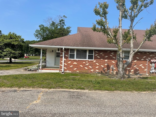 122 Elmtowne Blvd, Hammonton, NJ 08037 - view of front of house featuring brick siding, covered porch, a front lawn, and a shingled roof