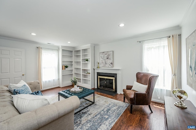 1632 Farm Brook Pl, Charlottesville, VA 22901 - living area with crown molding, a glass covered fireplace, dark wood-type flooring, and recessed lighting