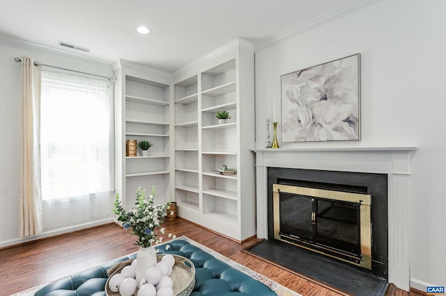 1632 Farm Brook Pl, Charlottesville, VA 22901 - living area featuring a glass covered fireplace, wood finished floors, and ornamental molding