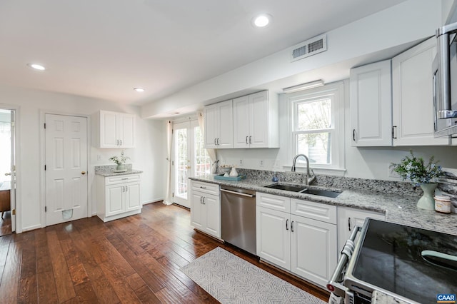 1632 Farm Brook Pl, Charlottesville, VA 22901 - kitchen featuring stainless steel appliances, healthy amount of natural light, dark wood-style flooring, white cabinetry, and recessed lighting