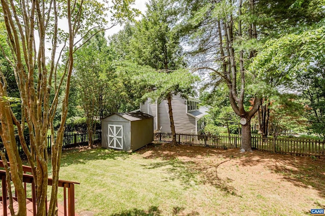 1632 Farm Brook Pl, Charlottesville, VA 22901 - fenced backyard featuring a storage shed and view of scattered trees