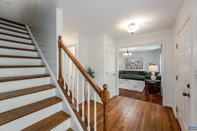 1632 Farm Brook Pl, Charlottesville, VA 22901 - staircase with wood finished floors and a chandelier