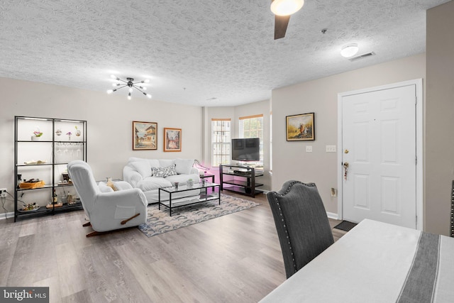 50 Amberstone Ct, Annapolis, MD 21403 - living room featuring wood finished floors and a textured ceiling