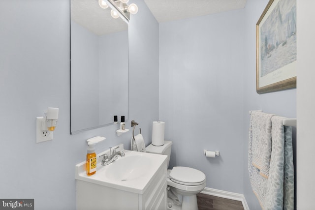 50 Amberstone Ct, Annapolis, MD 21403 - bathroom featuring vanity, wood finished floors, and a textured ceiling