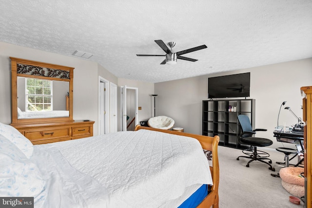 50 Amberstone Ct, Annapolis, MD 21403 - carpeted bedroom with an office area, a textured ceiling, and a ceiling fan