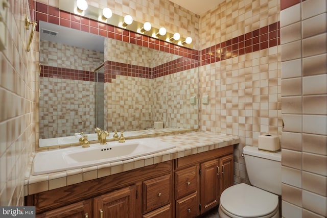6708 Langston Blvd Unit A, Arlington, VA 22205 - bathroom featuring tile walls and vanity