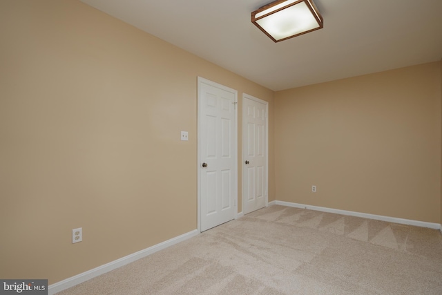 6708 Langston Blvd Unit A, Arlington, VA 22205 - spare room with baseboards and light colored carpet