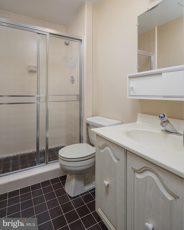6708 Langston Blvd Unit A, Arlington, VA 22205 - full bathroom featuring vanity, tile patterned floors, and a stall shower