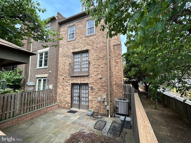6708 Langston Blvd Unit A, Arlington, VA 22205 - back of property with brick siding and a patio area
