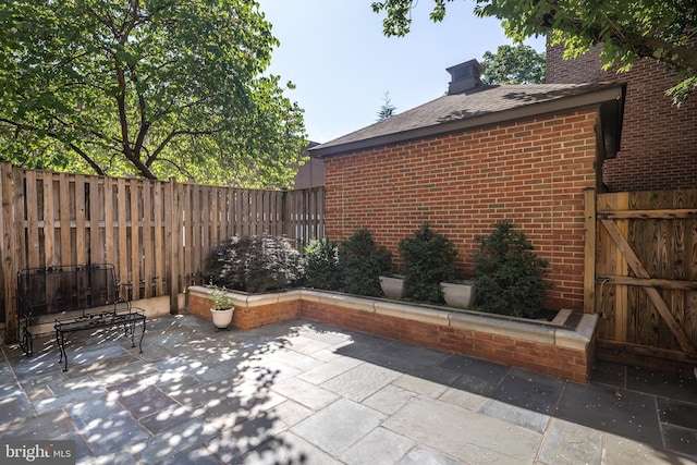 6708 Langston Blvd Unit A, Arlington, VA 22205 - fenced backyard featuring a patio and a gate