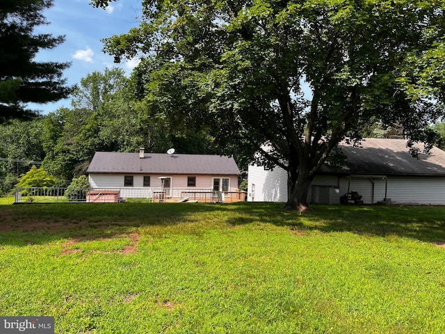 636 Pigeon Creek Rd, Pottstown, PA 19465 - view of front facade featuring a front yard and a wooden deck