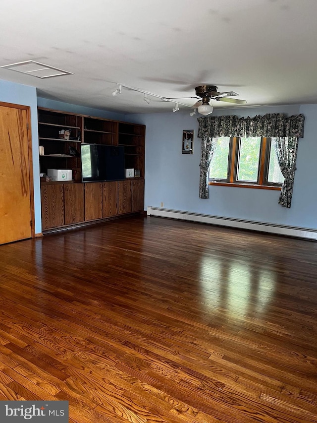 636 Pigeon Creek Rd, Pottstown, PA 19465 - unfurnished living room with wood finished floors, ceiling fan, and baseboard heating