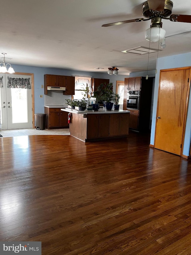 636 Pigeon Creek Rd, Pottstown, PA 19465 - kitchen with oven, a ceiling fan, dark wood-style flooring, and a kitchen island