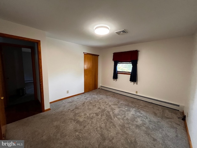 636 Pigeon Creek Rd, Pottstown, PA 19465 - unfurnished bedroom with a baseboard heating unit, carpet, and a closet
