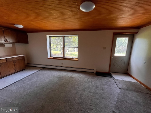 636 Pigeon Creek Rd, Pottstown, PA 19465 - unfurnished living room featuring a baseboard heating unit, wooden ceiling, and light colored carpet