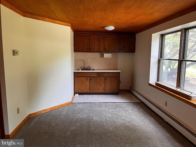 636 Pigeon Creek Rd, Pottstown, PA 19465 - kitchen with a baseboard radiator, light countertops, wooden ceiling, light carpet, and crown molding