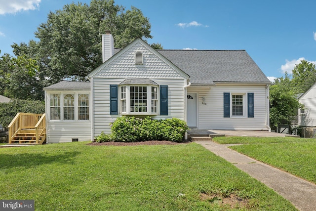 202 Piping Rock Dr, Silver Spring, MD 20905 - view of front of house featuring a chimney, a front lawn, roof with shingles, and a deck