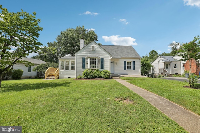 202 Piping Rock Dr, Silver Spring, MD 20905 - view of front of home featuring a chimney, a front lawn, crawl space, and roof with shingles