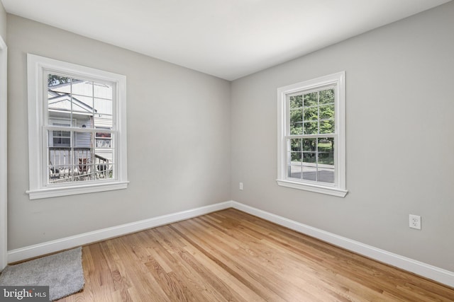 202 Piping Rock Dr, Silver Spring, MD 20905 - unfurnished room featuring baseboards and light wood-style flooring
