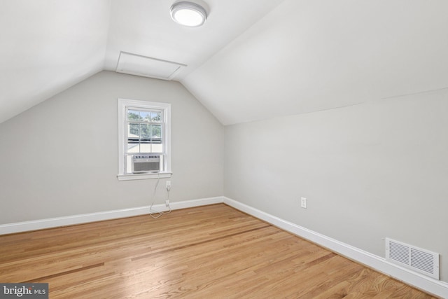 202 Piping Rock Dr, Silver Spring, MD 20905 - bonus room with cooling unit, light wood-style floors, and vaulted ceiling