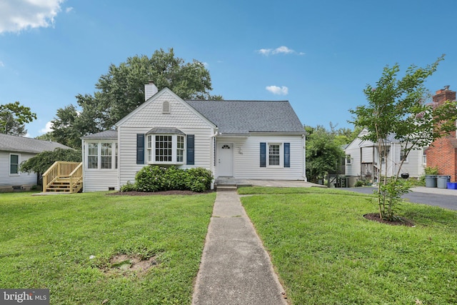 202 Piping Rock Dr, Silver Spring, MD 20905 - view of front of house with a chimney, a front lawn, a deck, and roof with shingles