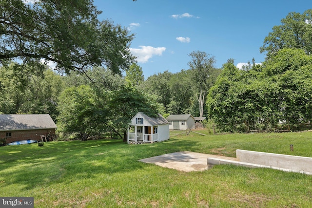 202 Piping Rock Dr, Silver Spring, MD 20905 - view of green lawn featuring an outdoor structure