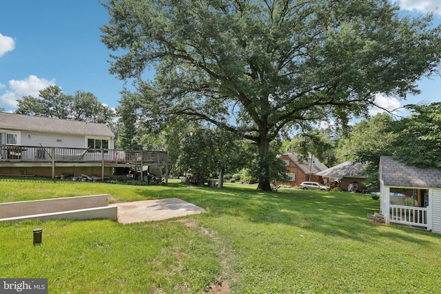 202 Piping Rock Dr, Silver Spring, MD 20905 - view of grassy yard with a deck and an outbuilding