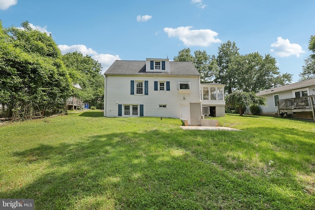 202 Piping Rock Dr, Silver Spring, MD 20905 - back of house with a lawn, a sunroom, and a patio