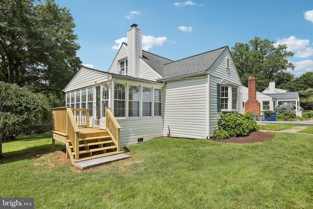 202 Piping Rock Dr, Silver Spring, MD 20905 - back of house with roof with shingles, a sunroom, a yard, a chimney, and a wooden deck