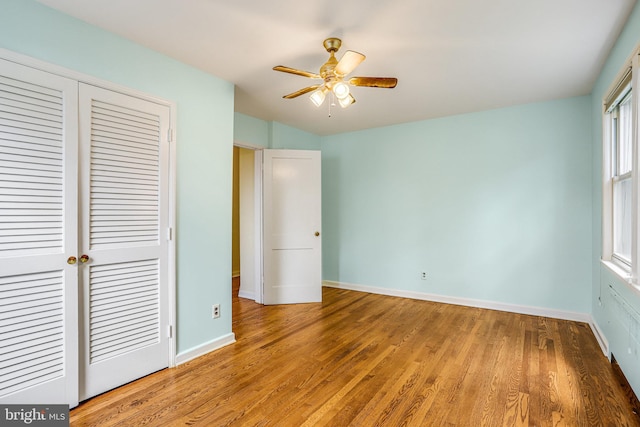 4004 Beecher St NW Unit 304, Washington, DC 20007 - unfurnished bedroom featuring a closet, wood finished floors, and ceiling fan