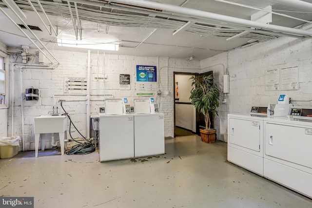 4004 Beecher St NW Unit 304, Washington, DC 20007 - unfinished basement with washer and dryer and concrete block wall