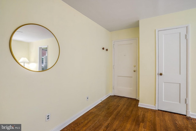 4004 Beecher St NW Unit 304, Washington, DC 20007 - hallway with baseboards and wood finished floors