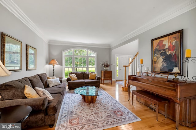 1701 Glenbar Dr, Finksburg, MD 21048 - living room featuring ornamental molding, light wood-type flooring, and stairway