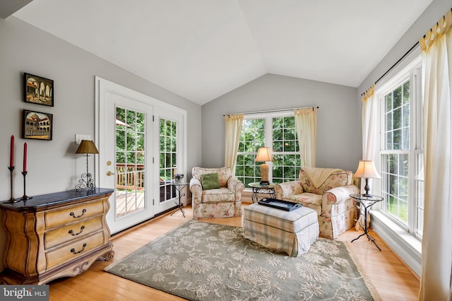1701 Glenbar Dr, Finksburg, MD 21048 - living area with plenty of natural light, light wood-style floors, and vaulted ceiling