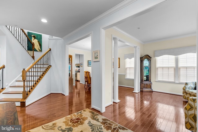 22351 Winding Woods Way, Clarksburg, MD 20871 - entrance foyer with decorative columns, wood finished floors, crown molding, and stairway