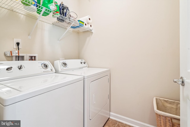 130 Ambrose Ln, Fredericksburg, VA 22406 - laundry room with separate washer and dryer and light tile patterned floors
